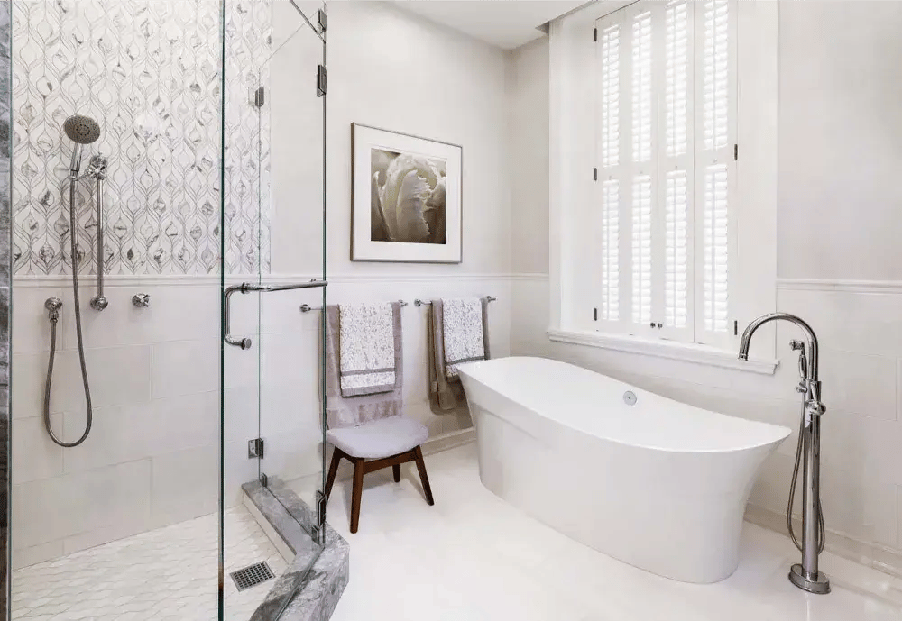 Classic tile bathroom with frameless glass shower and soaker tub