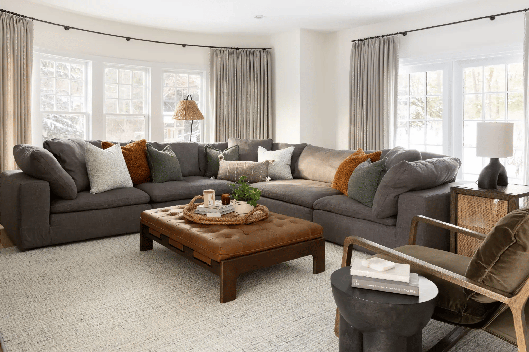 Spacious living room with sectional sofa and wood coffee table in Greater Boston