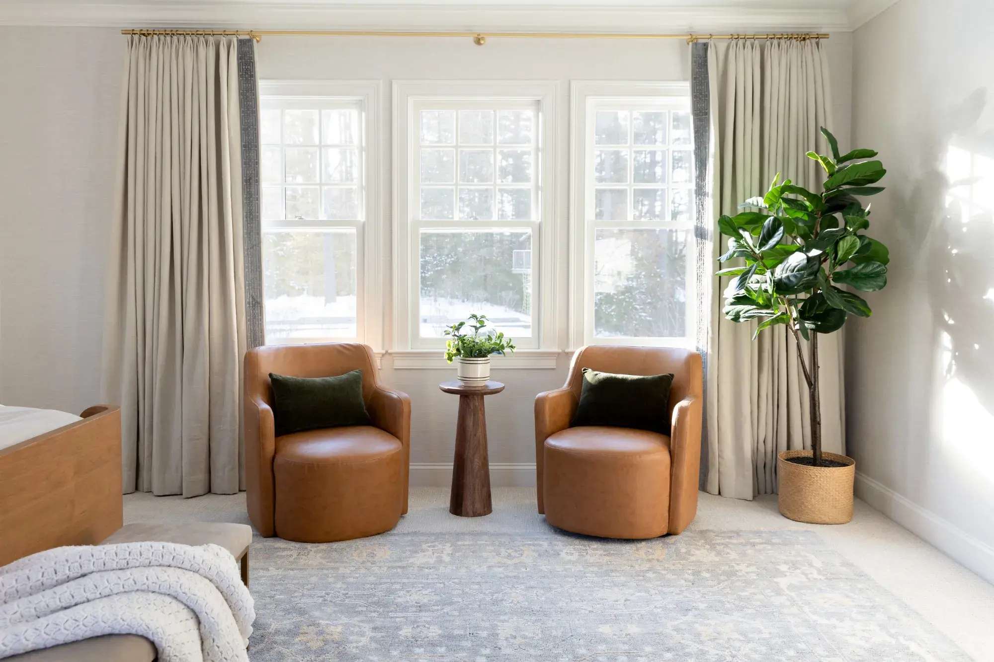 seating area with large window in primary suite in Boston MA